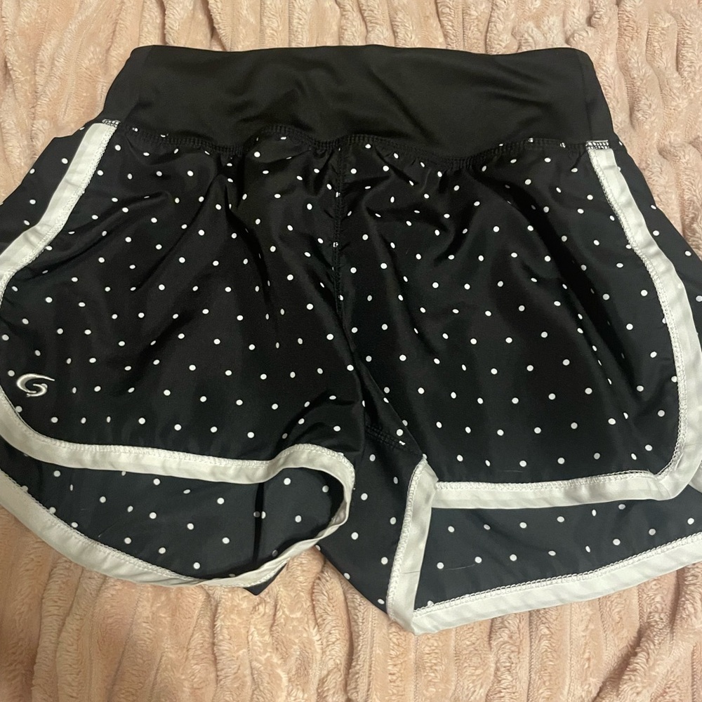 Polkadot running shorts.